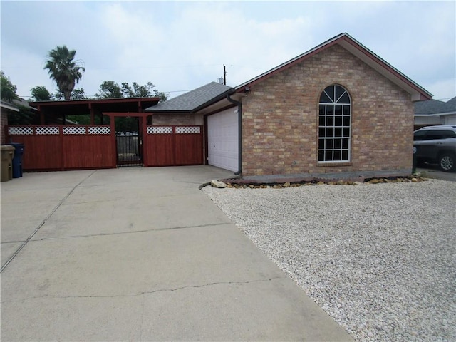 view of front of property with a garage