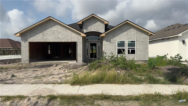 7617 Roman Dr, Corpus Christi, TX 78414 - view of front of property with a garage and stone siding