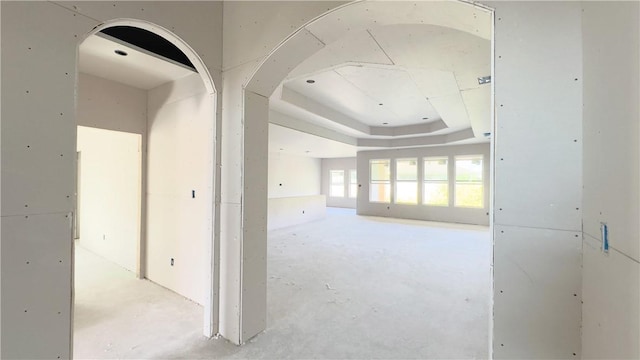 7617 Roman Dr, Corpus Christi, TX 78414 - hall with unfinished concrete floors and a raised ceiling