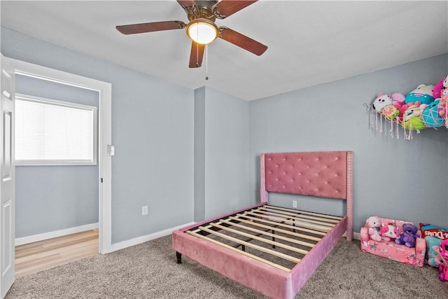 bedroom featuring ceiling fan and carpet flooring