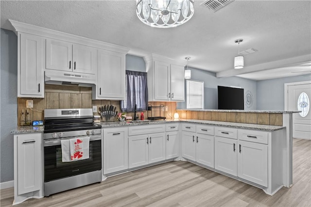 kitchen featuring pendant lighting, white cabinetry, sink, light wood-type flooring, and stainless steel electric range