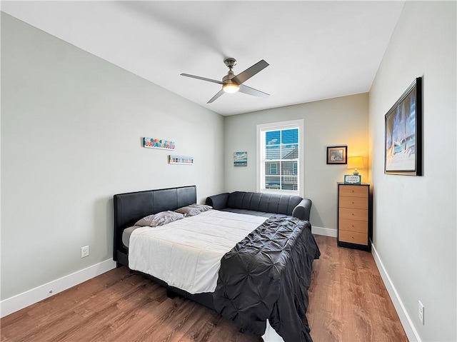 14307 Ridley Way, Corpus Christi, TX 78418 - bedroom featuring wood finished floors, baseboards, and a ceiling fan