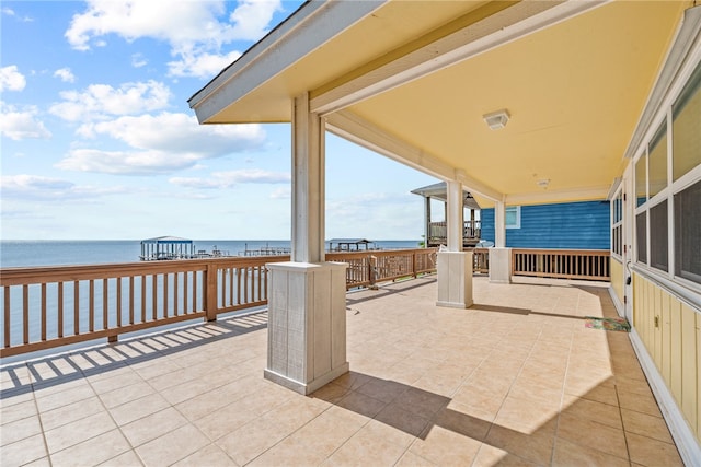 view of patio / terrace with a water view