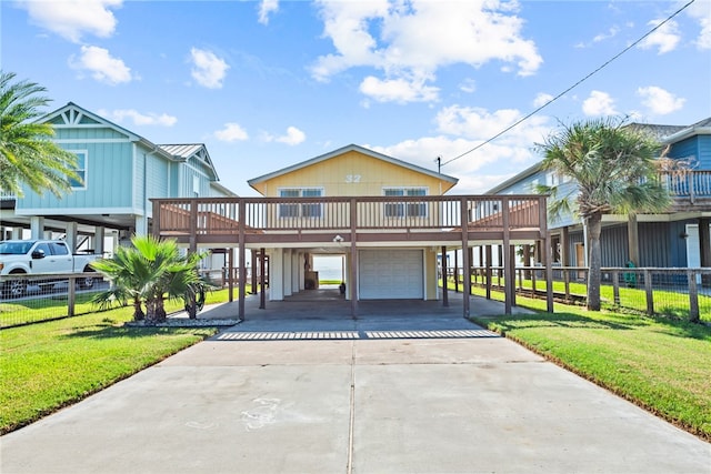 view of front of property with a garage and a front yard