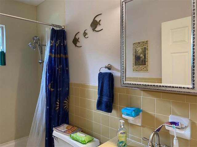 bathroom featuring tile walls, walk in shower, and toilet