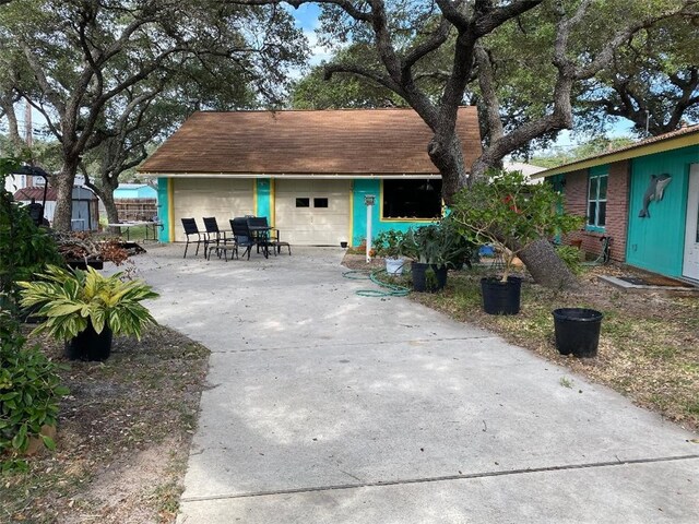 exterior space featuring a garage