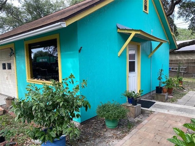 exterior space with a garage