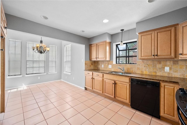 kitchen with decorative light fixtures, light tile patterned floors, backsplash, a sink, and black appliances