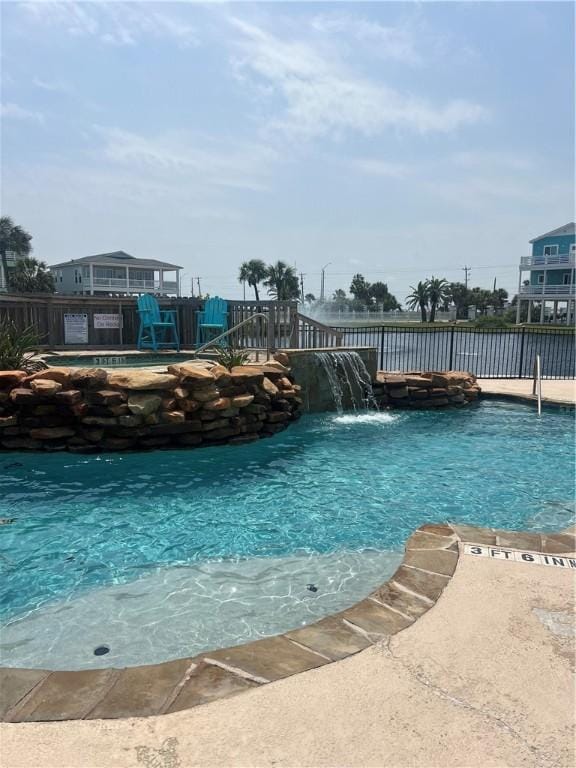 162 La Concha Blvd Unit 29, Port Aransas, TX 78373 - community pool featuring fence
