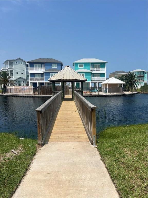 162 La Concha Blvd Unit 29, Port Aransas, TX 78373 - view of dock featuring a residential view, a gazebo, and a water view