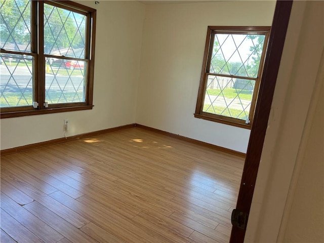 10801 Mayfield Dr, Corpus Christi, TX 78410 - spare room featuring light wood finished floors and baseboards