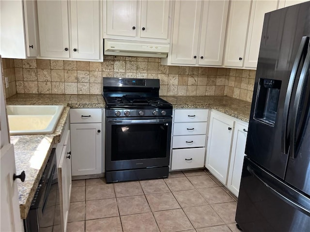 10801 Mayfield Dr, Corpus Christi, TX 78410 - kitchen featuring black appliances, under cabinet range hood, white cabinetry, backsplash, and a sink