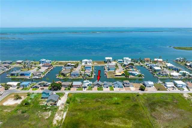 aerial view featuring a residential view and a water view