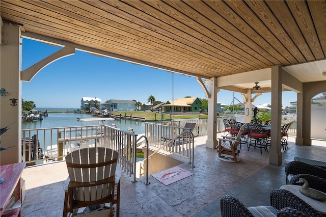 view of patio / terrace featuring a water view