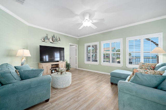 living room featuring crown molding, ceiling fan, and light hardwood / wood-style flooring