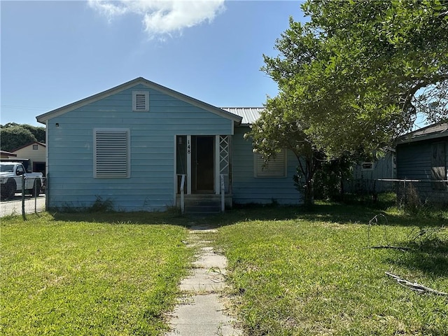 148 N Rife St, Aransas Pass, TX 78336 - view of front of home featuring a metal roof
