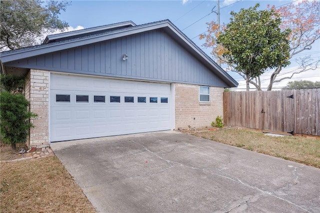 4826 Olympia Dr, Corpus Christi, TX 78413 - view of property exterior featuring brick siding, concrete driveway, and an attached garage