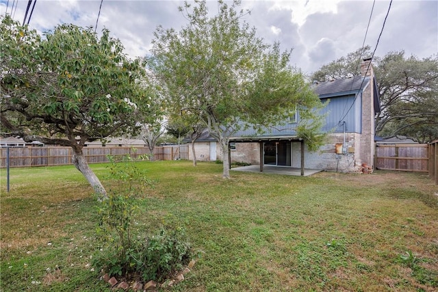 4826 Olympia Dr, Corpus Christi, TX 78413 - fenced backyard with a patio area