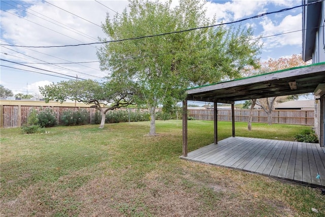 view of yard with a deck