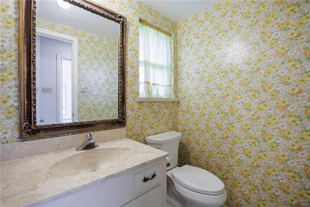 4826 Olympia Dr, Corpus Christi, TX 78413 - half bath featuring vanity and wallpapered walls