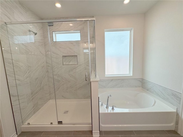 130 Broad Oak Dr, Rockport, TX 78382 - full bathroom featuring a garden tub, tile patterned flooring, a shower stall, and recessed lighting