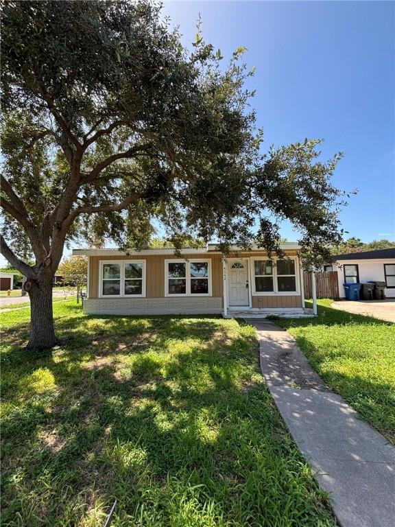 4342 Amherst Dr, Corpus Christi, TX 78412 - view of front of home with a front yard