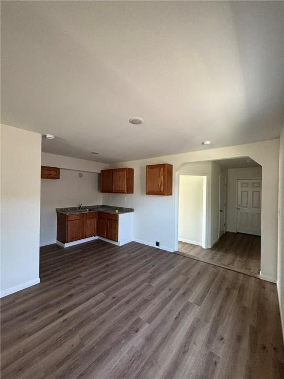 4342 Amherst Dr, Corpus Christi, TX 78412 - unfurnished living room featuring dark wood finished floors