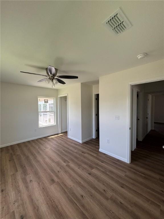 4342 Amherst Dr, Corpus Christi, TX 78412 - unfurnished bedroom with dark wood finished floors, a ceiling fan, and a closet