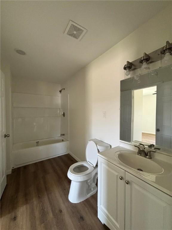 4342 Amherst Dr, Corpus Christi, TX 78412 - bathroom featuring vanity, wood finished floors, and washtub / shower combination