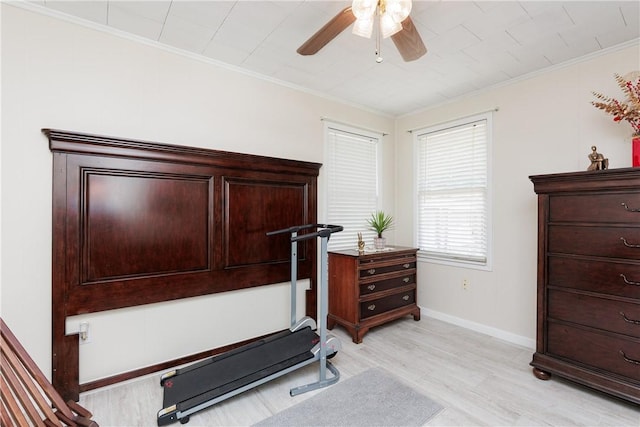 10639 Emmord Loop, Corpus Christi, TX 78410 - workout room with a ceiling fan, light wood-type flooring, crown molding, and baseboards