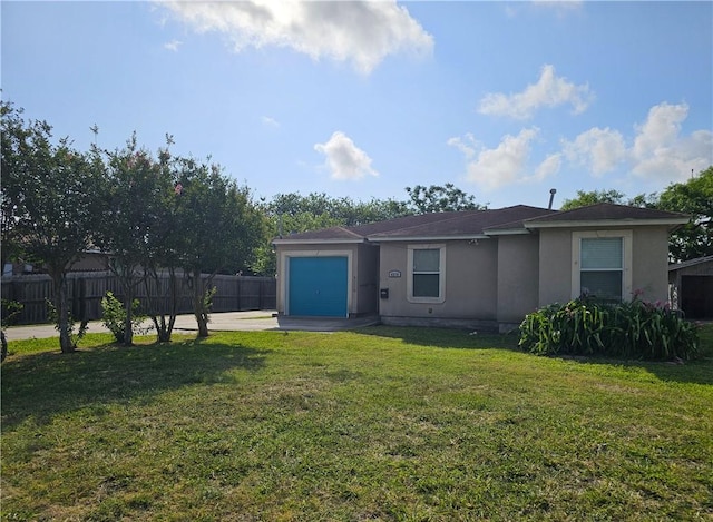 4318 Ivy, Corpus Christi, TX 78415 - view of front of home featuring stucco siding, an attached garage, and concrete driveway