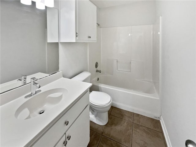 2613 Raintree Trl, Ingleside, TX 78362 - bathroom featuring vanity, toilet, baseboards, shower / washtub combination, and tile patterned floors