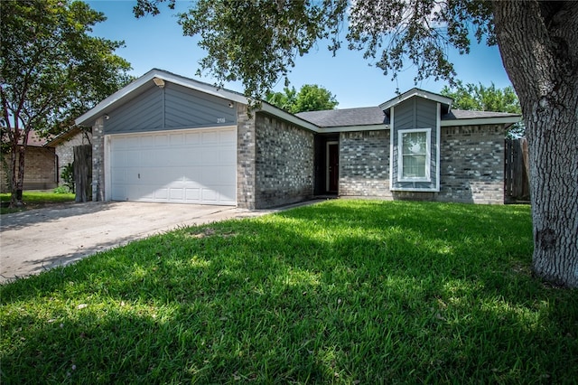 single story home featuring a garage and a front lawn