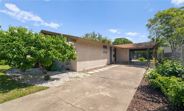 view of front of house featuring a carport