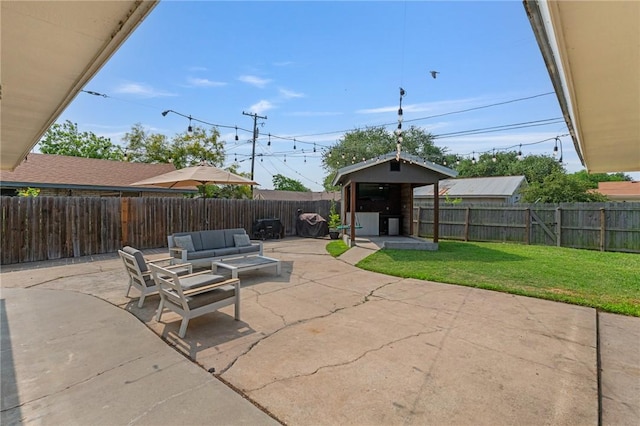 116 Daniel Moore St, Portland, TX 78374 - view of patio / terrace with an outdoor living space, an outbuilding, and a storage shed