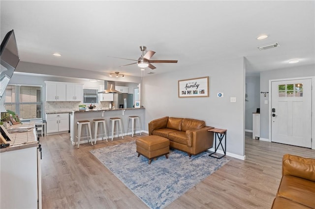 116 Daniel Moore St, Portland, TX 78374 - living area with ceiling fan, light wood finished floors, baseboards, and recessed lighting