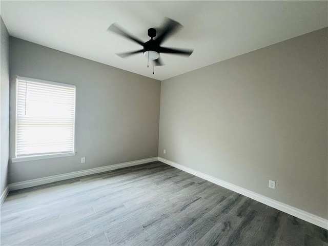 7722 Nadia Dr, Corpus Christi, TX 78414 - empty room with ceiling fan, baseboards, and dark wood finished floors