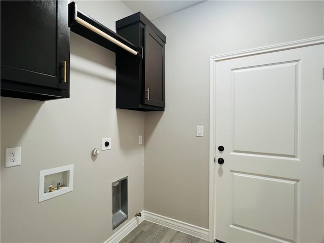 7722 Nadia Dr, Corpus Christi, TX 78414 - washroom featuring gas dryer hookup, cabinet space, wood finished floors, and electric dryer hookup