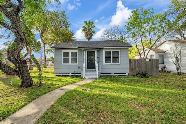 view of outbuilding with fence