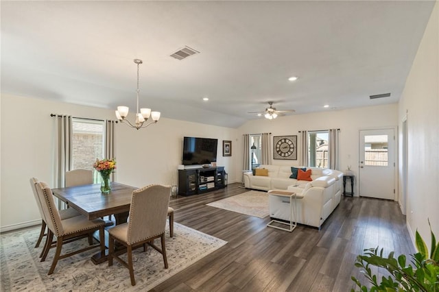 dining room featuring a wealth of natural light, visible vents, and dark wood-style flooring