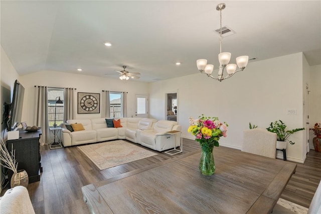 interior space featuring recessed lighting, visible vents, wood finished floors, vaulted ceiling, and ceiling fan with notable chandelier