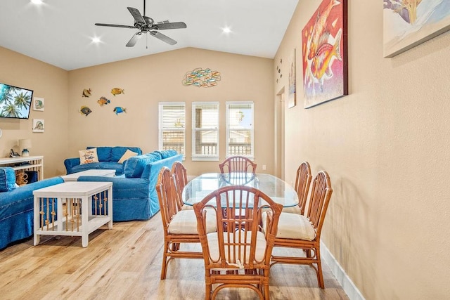 dining space featuring light wood finished floors, ceiling fan, lofted ceiling, and recessed lighting