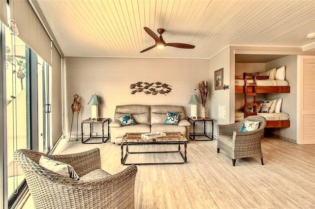 7477 State Highway 361 Unit 107, Port Aransas, TX 78373 - living area featuring wood ceiling, a ceiling fan, and wood finished floors