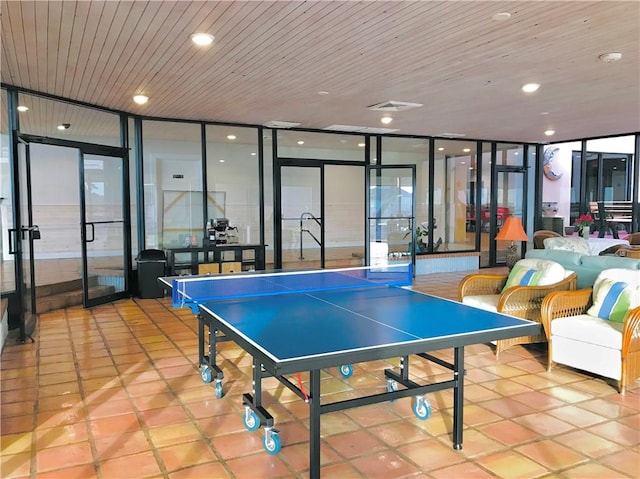 7477 State Highway 361 Unit 107, Port Aransas, TX 78373 - playroom featuring expansive windows, tile patterned floors, and wood ceiling