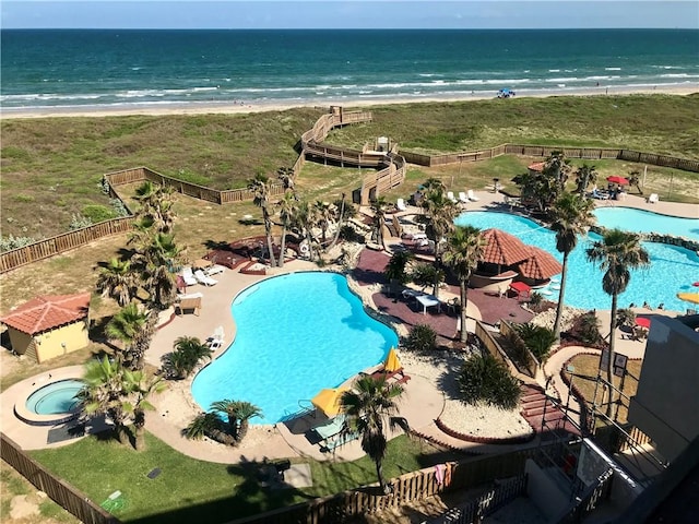 7477 State Highway 361 Unit 107, Port Aransas, TX 78373 - drone / aerial view of waterfront with a beach