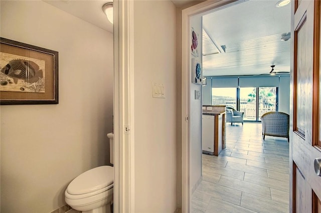 7477 State Highway 361 Unit 107, Port Aransas, TX 78373 - bathroom featuring toilet and ceiling fan