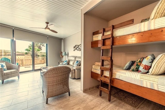 7477 State Highway 361 Unit 107, Port Aransas, TX 78373 - bedroom featuring access to outside and ceiling fan