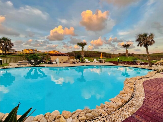 7477 State Highway 361 Unit 107, Port Aransas, TX 78373 - view of pool featuring a fenced backyard and a patio