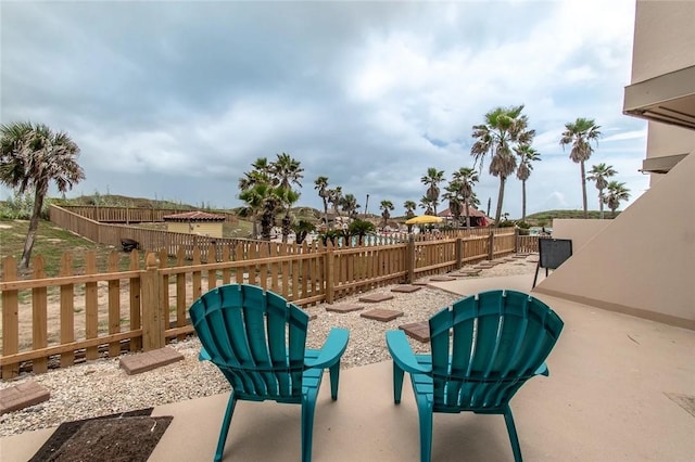 7477 State Highway 361 Unit 107, Port Aransas, TX 78373 - fenced backyard with a patio
