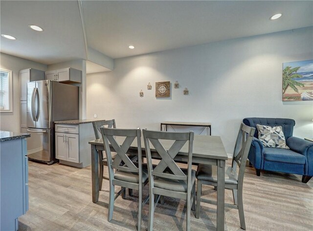 dining area with light wood-type flooring